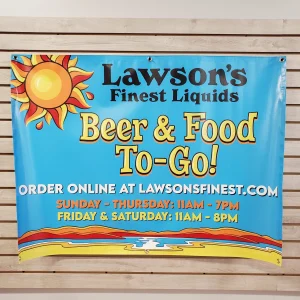 colourful banner for a restaurant installed on wood panels