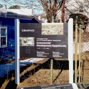 a sign advertising a commercial development opportunity