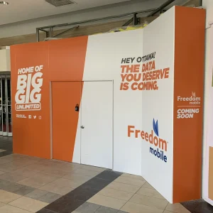 vinyl hoarding graphics for a mobile shop inside a mall
