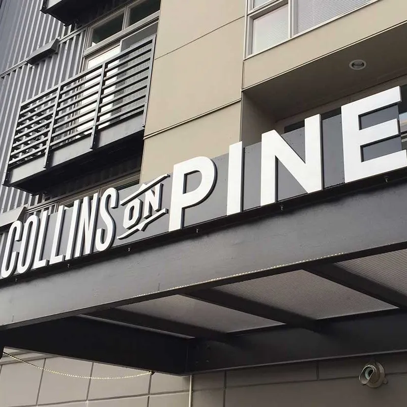 metal looking dimensional signage on the metal awning of a building