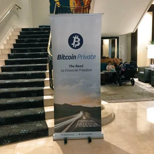 roll up banner that advertises cryptocurrency