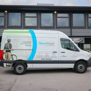 work vehicle with vinyl wrap and lettering