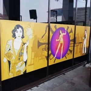 custom printed vinyl window graphics installed on exterior windows of a business