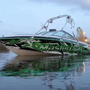 A speed boat with graphics that says MasterCraft on the water.