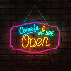 A led neon sign that says "Come in We are Open"