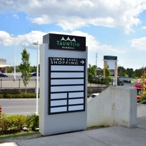 A monument sign for a mall that does not yet have any business names on it.