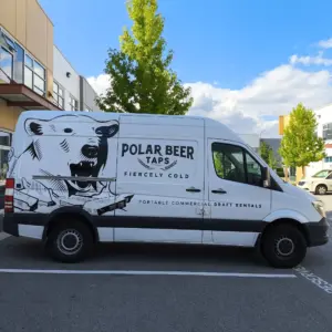 A work van with custom graphics for a beer company
